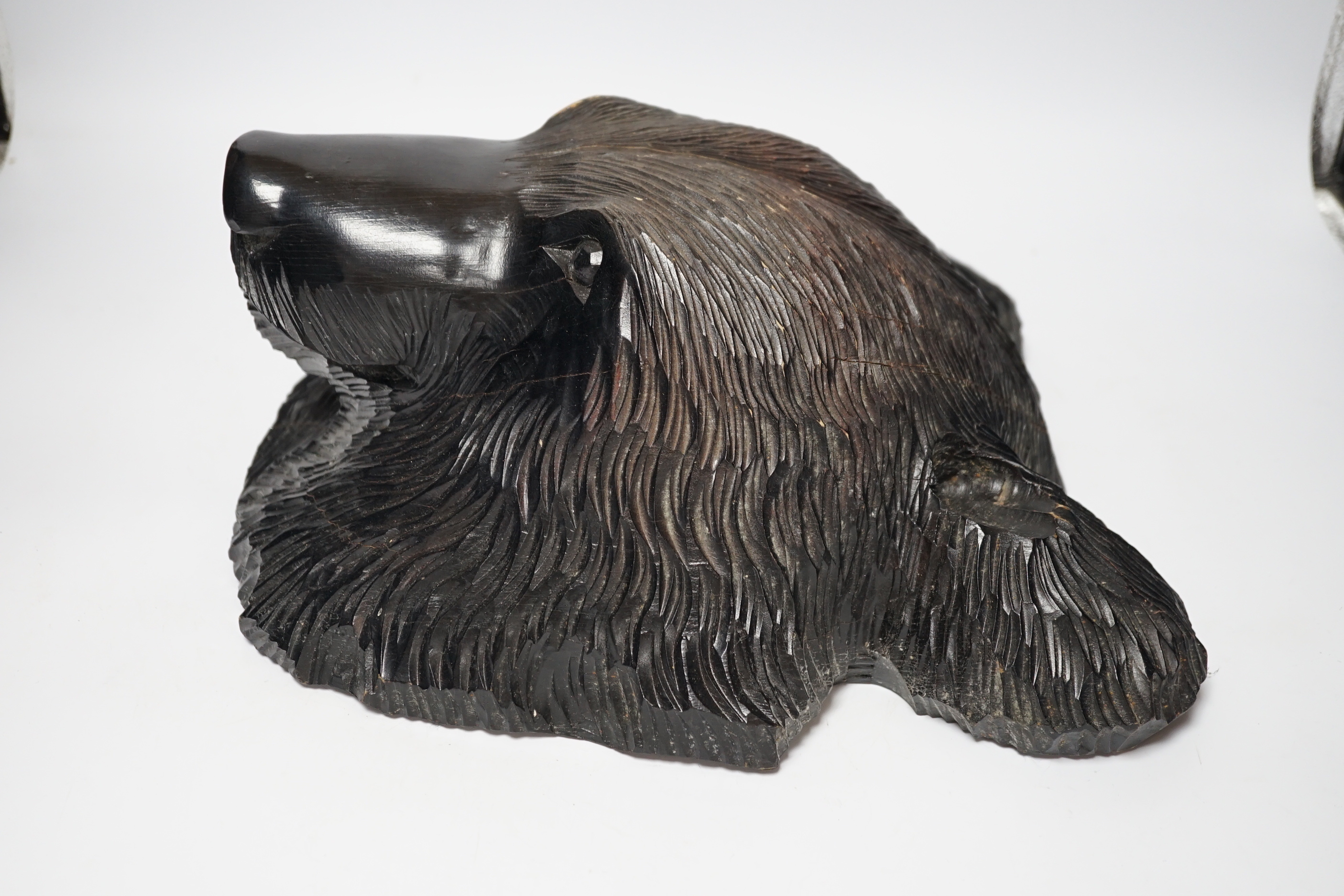 A Japanese carved wall hanging bear's head, 32cm high